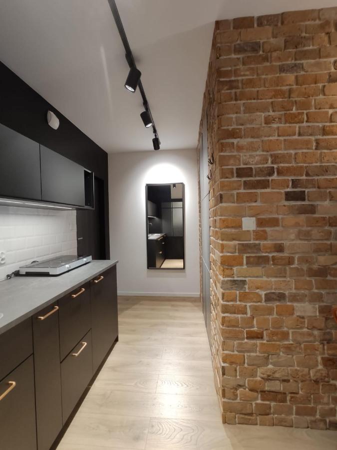 Red Wall Apartment In The Old Town กดัญสก์ ภายนอก รูปภาพ